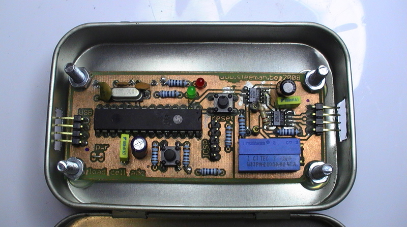 Board mounted in Altoids tin